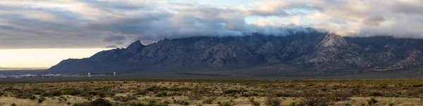 Beautiful Panoramic American Landscape during a cloudy sunrise. Taken North of El Paso, New Mexico, United States.