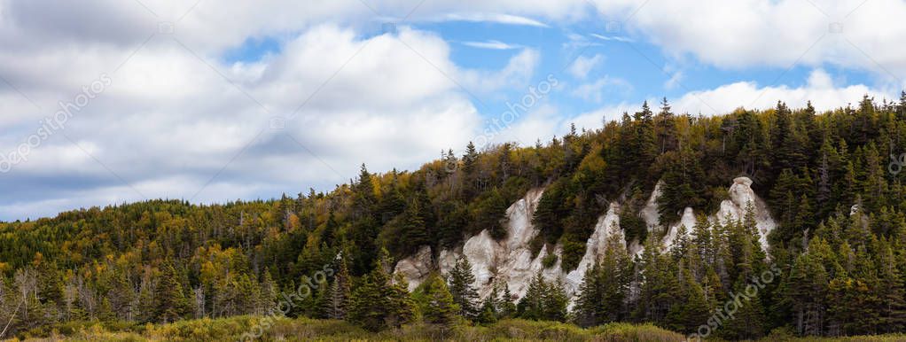 Panoramic view of a beautiful Canadian Landscape during a vibant sunny day in Fall Season. Taken in Newfoundland, Canada.