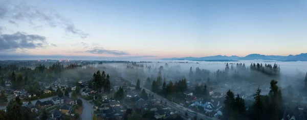 Aerial View Residential Neighborhood Covered Layer Fog Vibrant Sunrise Taken — Stock Photo, Image