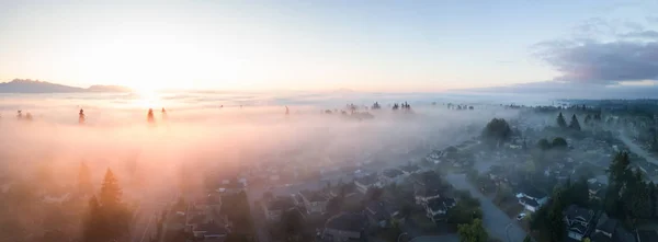 Aerial View Residential Neighborhood Covered Layer Fog Vibrant Sunrise Taken — Stock Photo, Image