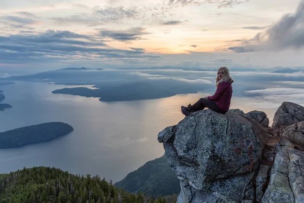 Adventurous Female Hiker Top Mountain Covered Clouds Vibrant Summer Sunset — Stock Photo, Image