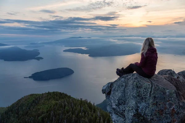 Adventurous Female Hiker Top Mountain Covered Clouds Vibrant Summer Sunset — Stock Photo, Image