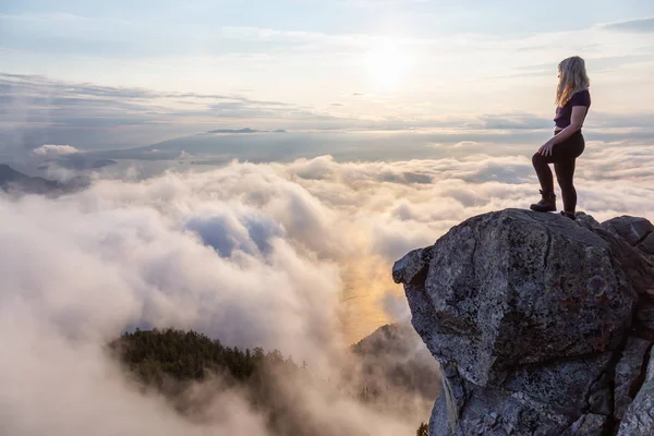 Adventurous Female Hiker Top Mountain Covered Clouds Vibrant Summer Sunset — Stock Photo, Image