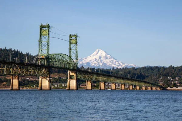 Beautiful View of Hood River Bridge going over Columbia River with Mt Hood in the background. Taken in White Salmon, Washington, USA.