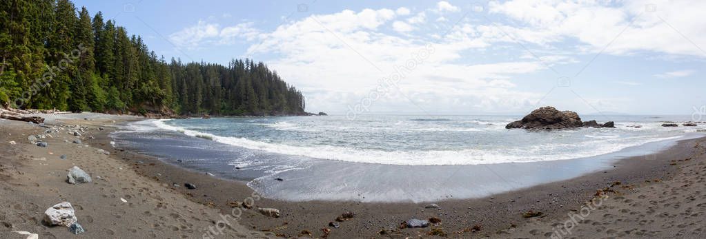 Beautiful Panoramic View of a rocky coast on the Juan de Fuca Trail during a sunny and cloudy summer day. Taken at Sombrio Beach, near Port Renfrew, Vancouver Island, BC, Canada.