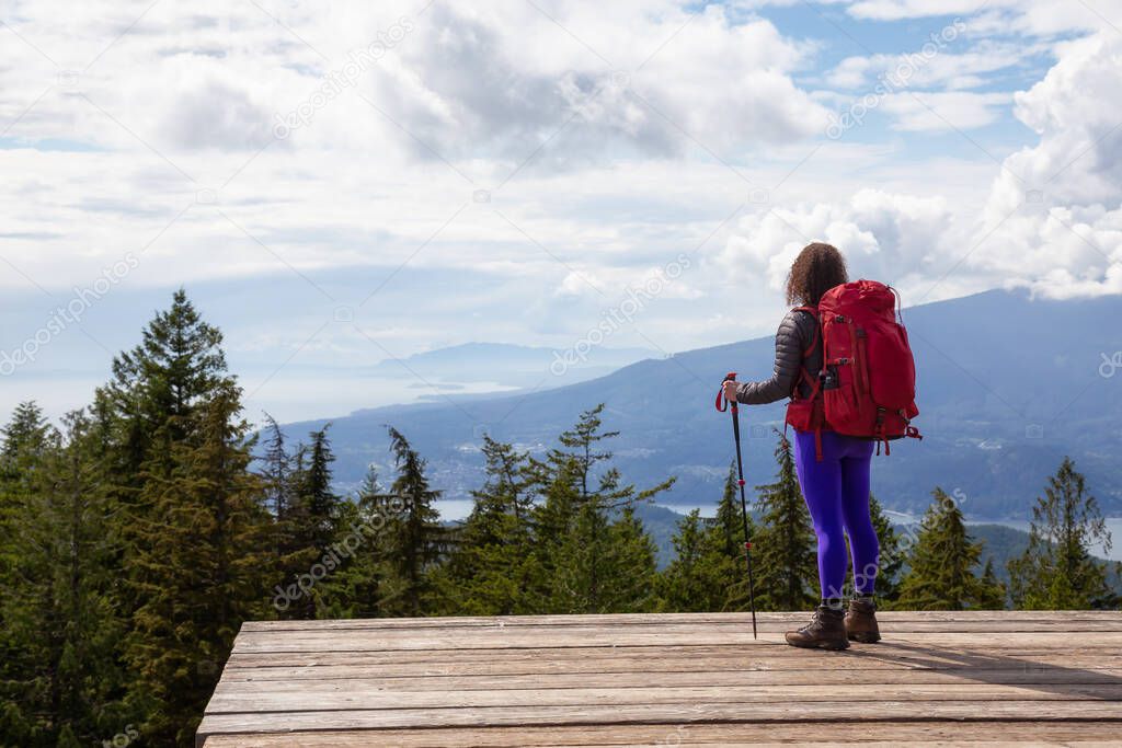Girl Hiking on top of Mountain in Bowen Island