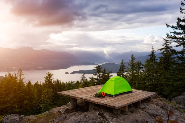 Camping Tent on top of a Mountain with Canadian Nature Landscape