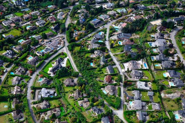 Aerial View of Residential Homes in a green neighborhood