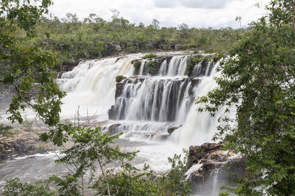 Landscape of big beautiful cerrado waterfall in the nature, Chapada dos Veadeiros, Goias, central Brazil
