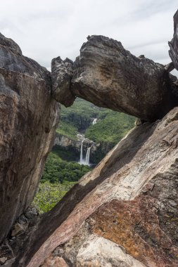 Beautiful landscape of big waterfalls in the nature seen from Mirante da Janela (Window Belvedere) in Chapada dos Veadeiros, Goias, central Brazil clipart