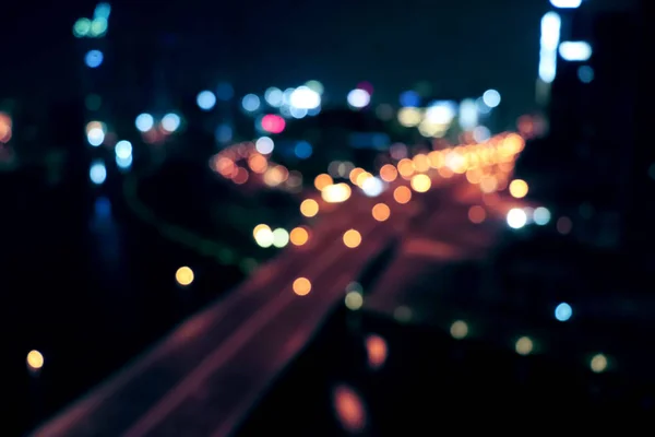 City light . Night city light life traffic. Blurred stop light. Vintage night city light. Urban cityscape abstract motion. Twilight sky background. — Stock Photo, Image