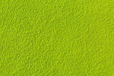 Yeşil matcha çay toz tam çerçeve düz görüntü arka planı olarak yatıyordu