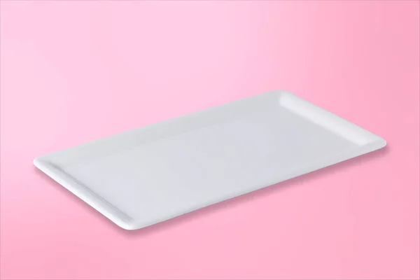 Empty white plate on gradient pink rose background — Stock Photo, Image
