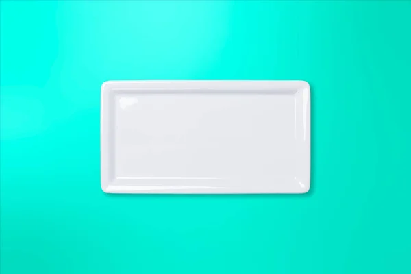 Empty white plate on teal gradient background — Stock Photo, Image