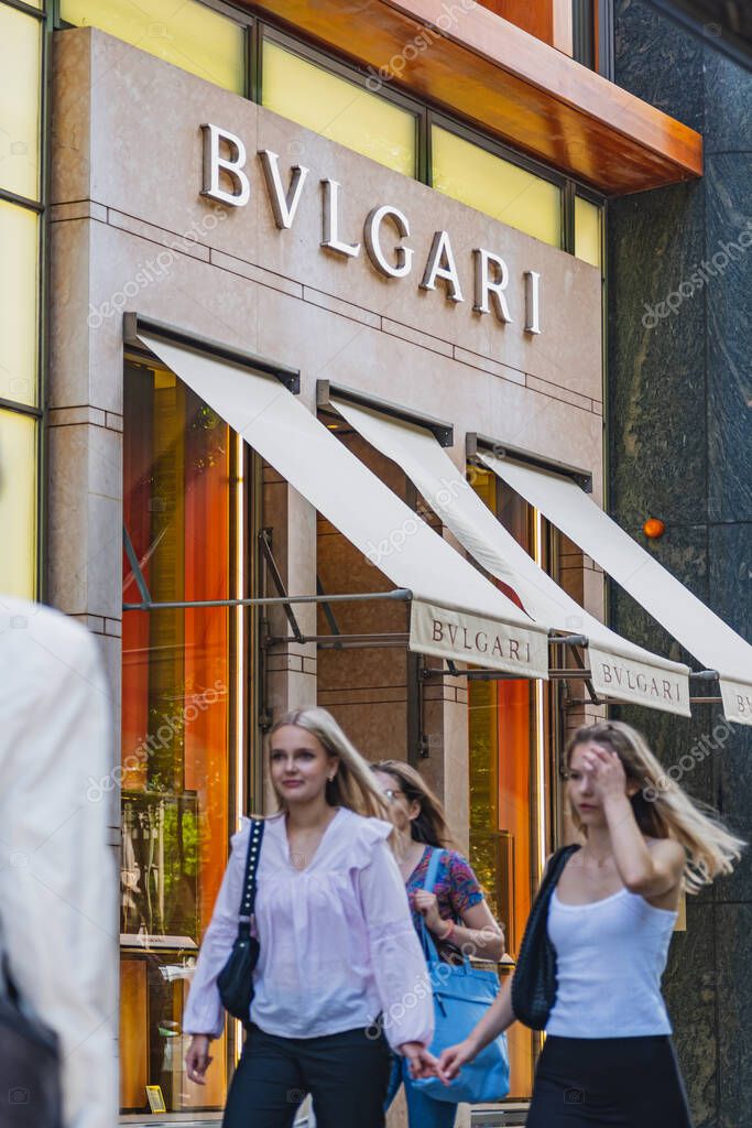 Bulgari luxury brand retail store with people passing by