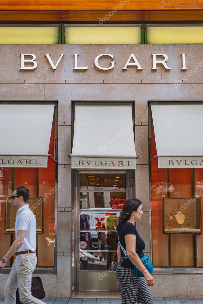 Bulgari luxury brand retail store with people passing by