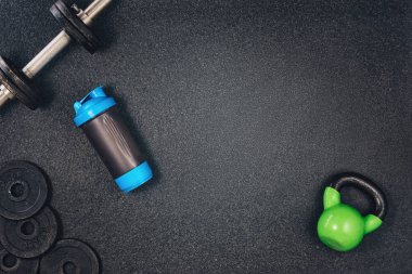 Fitness veya vücut geliştirme arka plan. Spor salonu zemin, halter ana sayfa görünümü