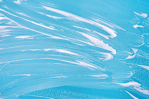 Textura de fondo de limpieza - espuma detergente de jabón químico en un vidrio transparente — Foto de Stock