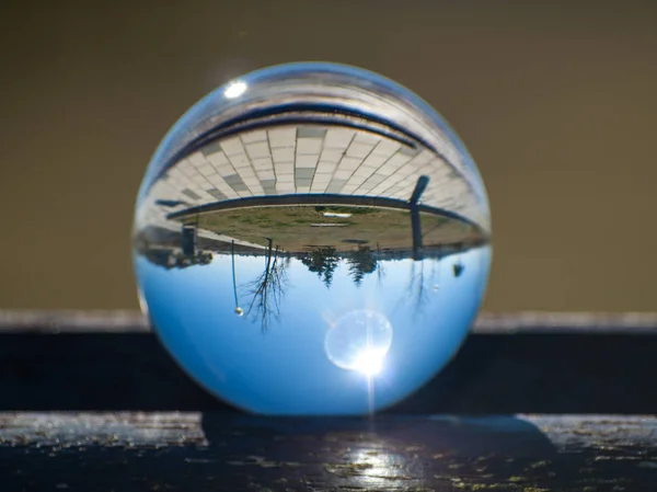 Reflections of clear sky in a crystal ball