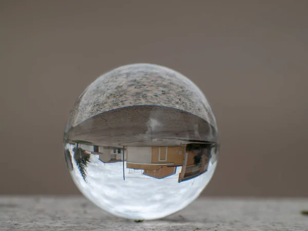 Reflections of the city in a crystal ball