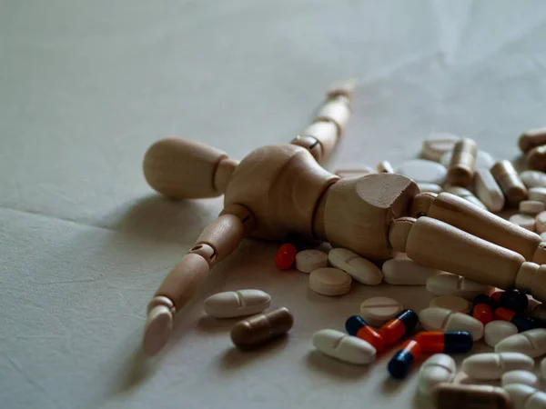 Wooden Figure Pills — Stock Photo, Image