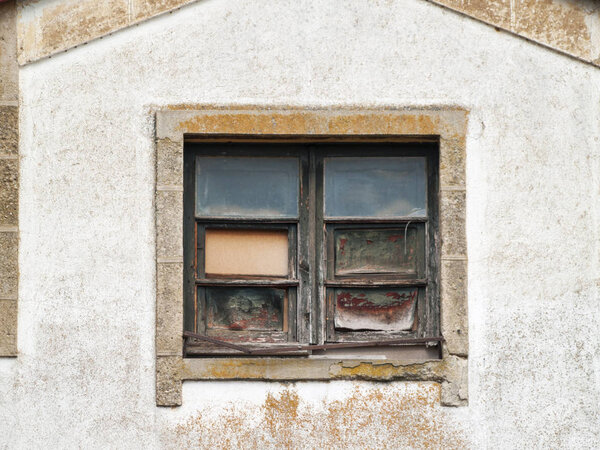 Spain. Old window in wooden frame 