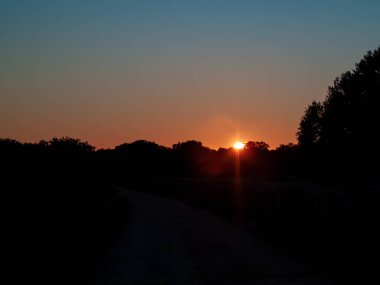 sunset in field of Cabeza de Diego Gomez,Salamanca, Spain clipart
