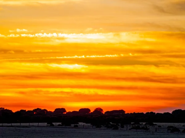sunset with orange sky in Cabeza de Diego Gomez , Spain