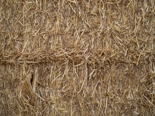干し草ベールの抽象的な自然なテクスチャ背景 — ストック写真