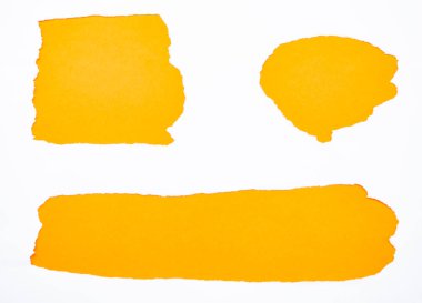 Torn white paper isolated on orange clipart