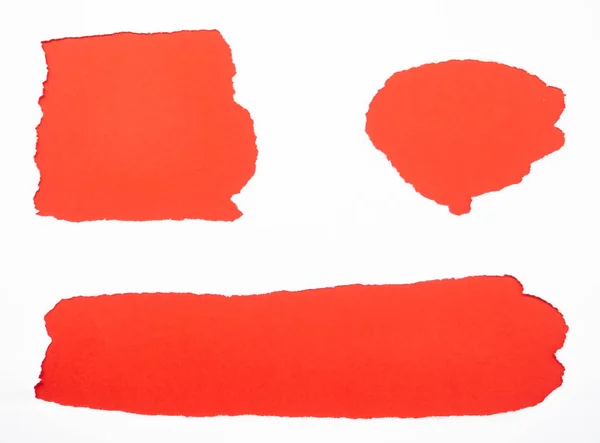 Livro branco rasgado isolado em vermelho — Fotografia de Stock