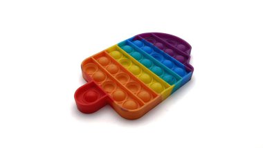 Renkli Pop it, Fidget Oyuncak beyaz arka planda Silikondan yapılmış