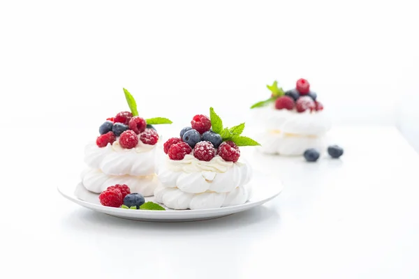Mini Pavlova Dessert Raspberries Blueberries Castor Sugar White Background — Stock Photo, Image
