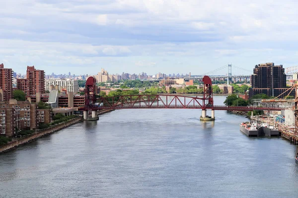 The Roosevelt Island Bridge.A lift bridge that connects Roosevelt Island in Manhattan to Astoria in Queens, crossing the East Channel of the East River