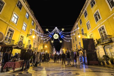 Exhibition of Wines of Lisbon  on Augusta street with Christmas and New Year decoration. Augusta street is a famous tourist attraction in Lisbon clipart