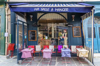Paris, France - March 13, 2018: View of typical restaurant in paris, France clipart