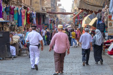 Cairo, Egypt - September 16, 2018: Walking by Khan el-Khalili, t clipart