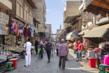 Cairo, Egypt - September 16, 2018: Walking by Khan el-Khalili, the major souk in the historic center of Islamic Cairo. The bazaar is one of Cairo's main attractions for tourists and Egyptians alike clipart