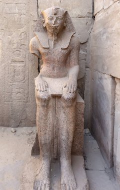 Seated Statue of Pharaoh Thutmose III near the Festival Hall of  clipart