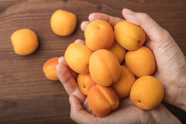 Ripe Organic Apricots Hands Girl Wooden Background — Stock Photo, Image