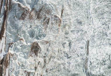 Kaba gri-mavi taş doku. Kaya oluşumu. Arka plan