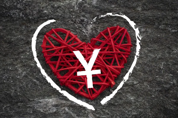 Love of money. China Yuan symbol on a red heart. Love theme