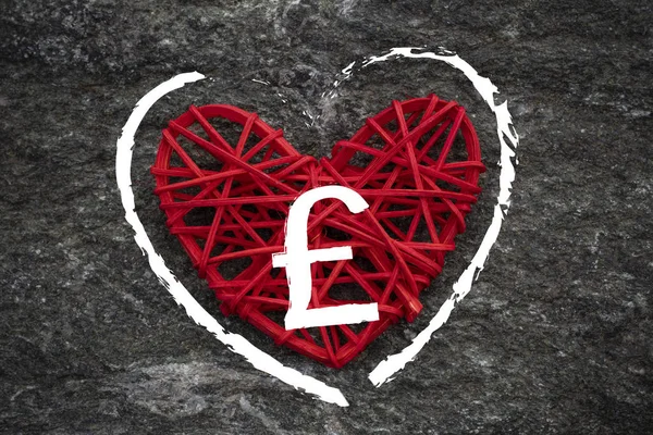 Love of money. Sterling Pound symbol on a red heart. Love theme