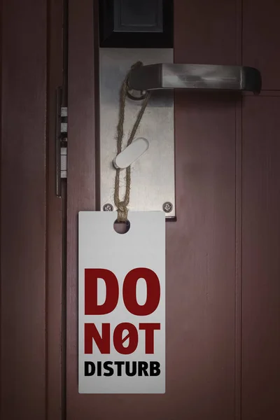 Do Not Disturb Sign. Hotel Door Hanger on a door handle