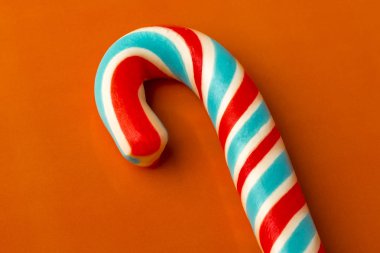 Noel Candy Cane turuncu zemin üzerine. Kopya alanı 