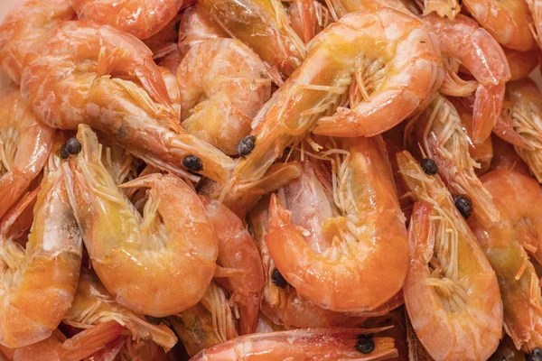 Boiled shrimps with lemon. Shrimp background. tiger boiled shrimps