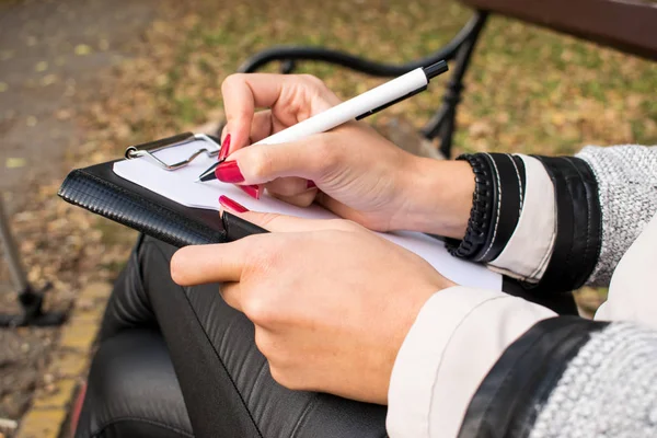 Women Hands Hold Pencil White Paper Park — Stock Photo, Image