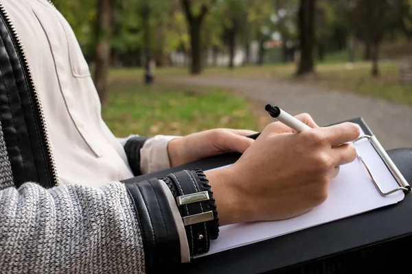 Women Hands Hold Pencil White Paper Park — Stock Photo, Image