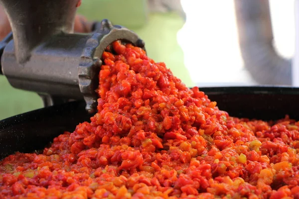 Mechanical Grinding Of Red Paprika