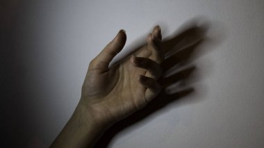 The hand of a dead woman clipart